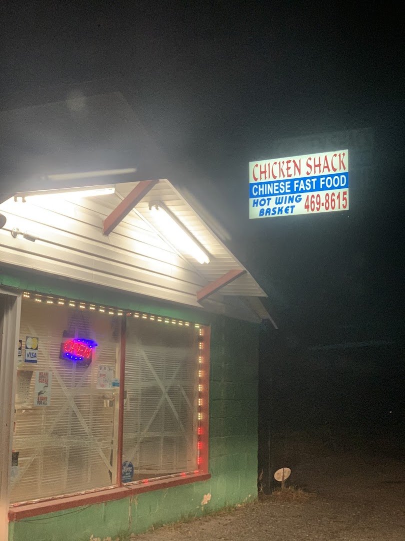 Restaurant entrance beside a busy road